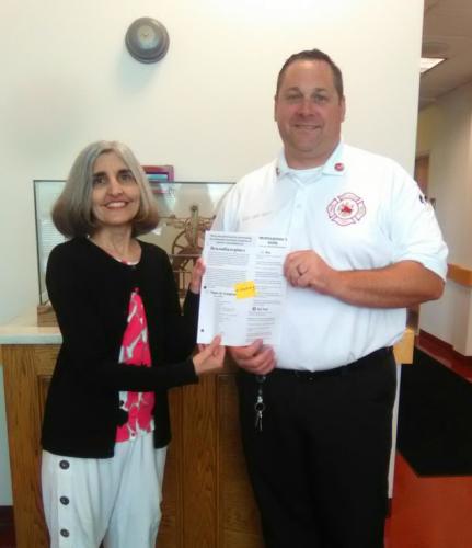 2017 - Lauren Omartian with local Firechief for W-BAD 1