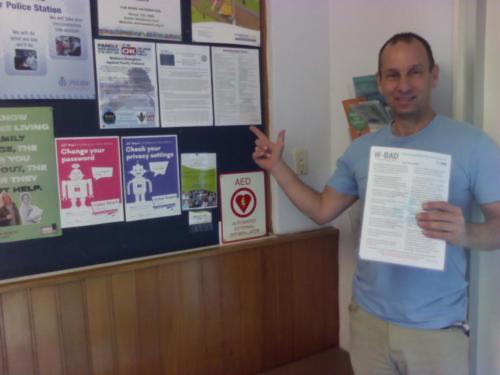 2018 - Wayne putting W-BAD pamplets on noticeboard at local police station in Taranaki, NZ